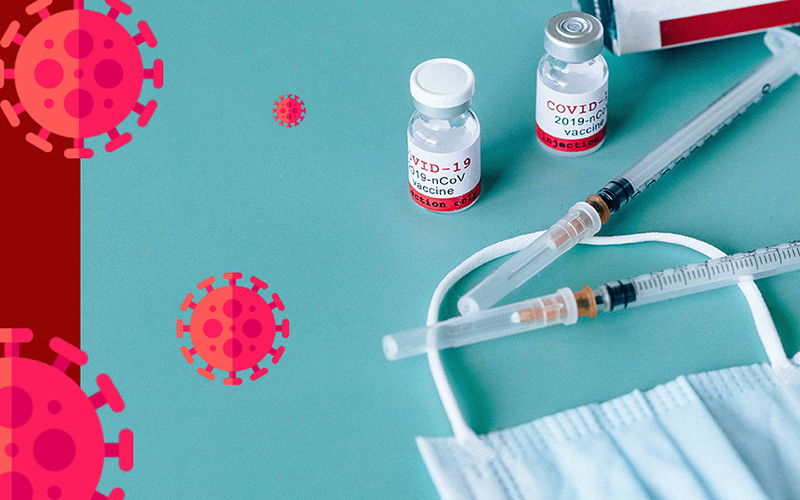 Illustration showing virus particles, hypodermic needles, vaccine vials and a face covering