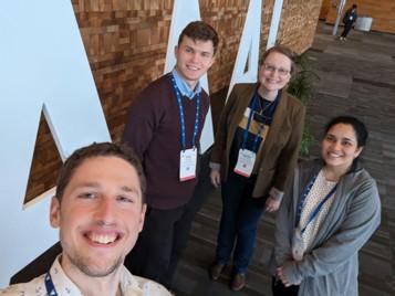 Photo of Martine and 3 of her graduate research students