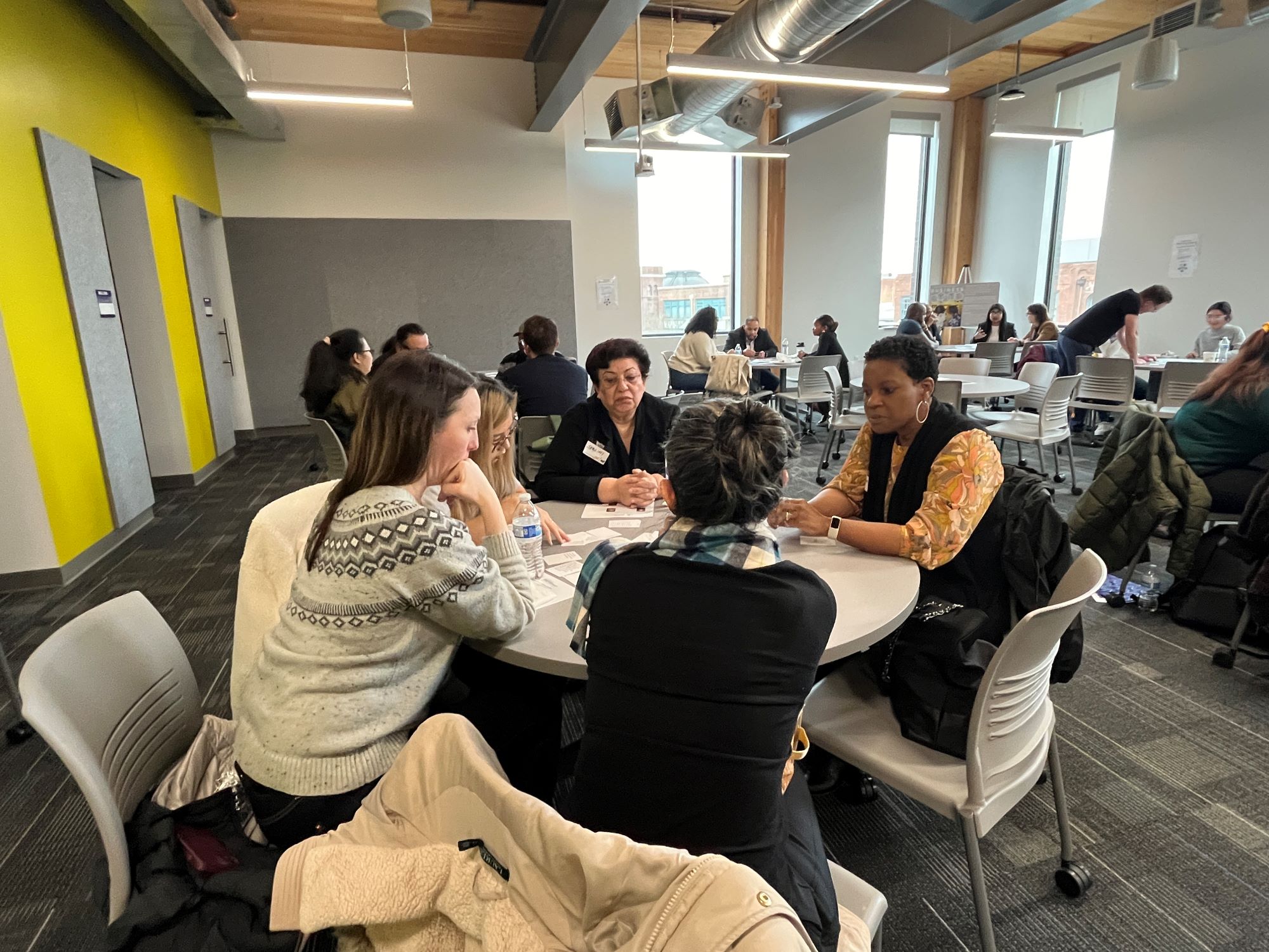 IIGE Community Advisory Board member Deneen Grant with UW Tacoma faculty and staff