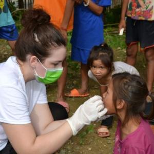 Katelyn demonstrating oral hygiene. 