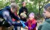 David Pavenko distributing food to children in Paraskoviivka, Ukraine.
